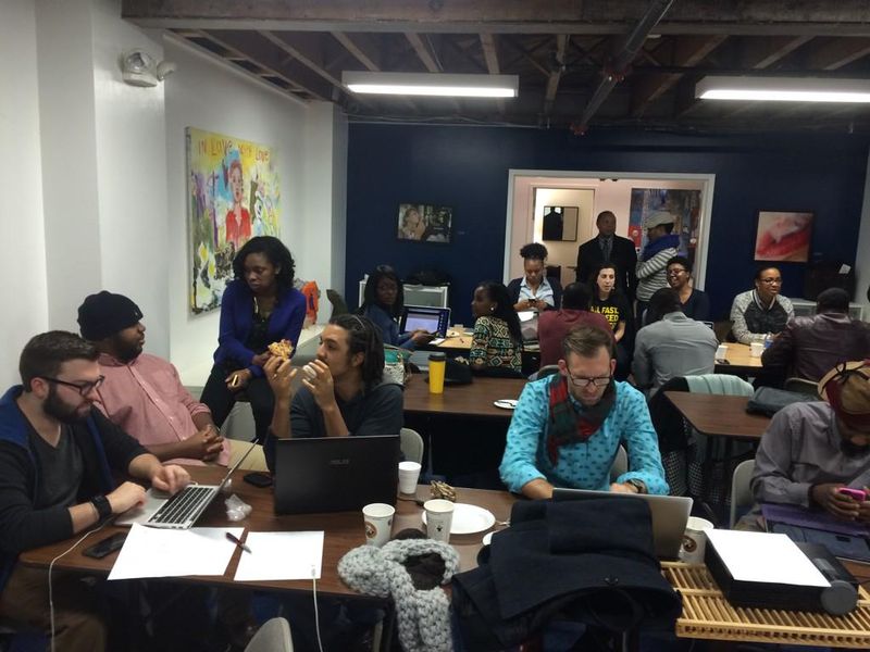 Participants at the D.C. site of the Diaspora Day of Civic Hacking — Photo Credit: <a href='https://twitter.com/sheiladcusa/status/564205890656796673'>Sheila Campbell</a>